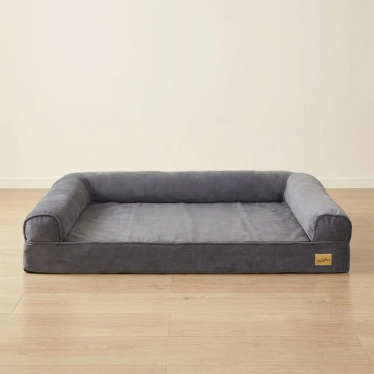Extra large grey orthopedic dog sofa bed on an oak floor