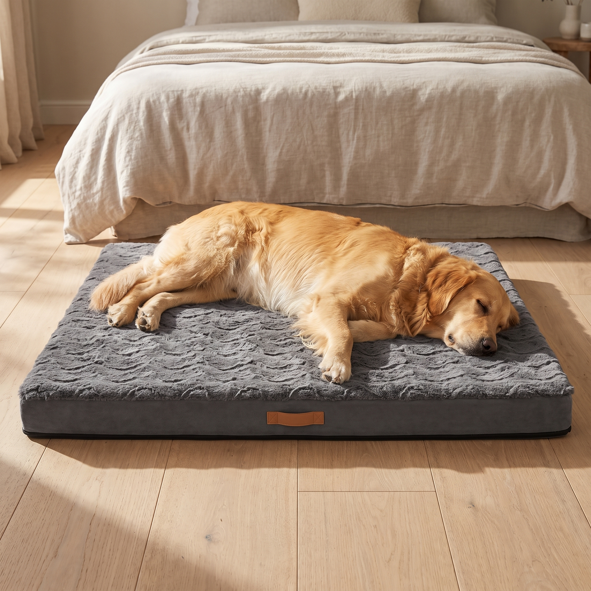 Golden retriever asleep on the dark grey foam crate mattress