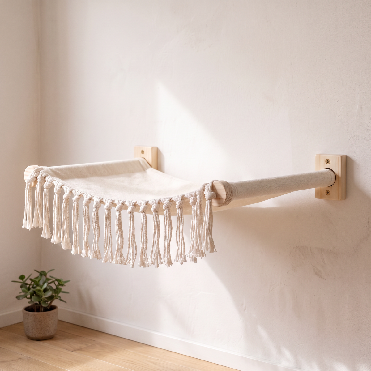 N1 Boho macrame cat wall hammock mounted in a bright cream room