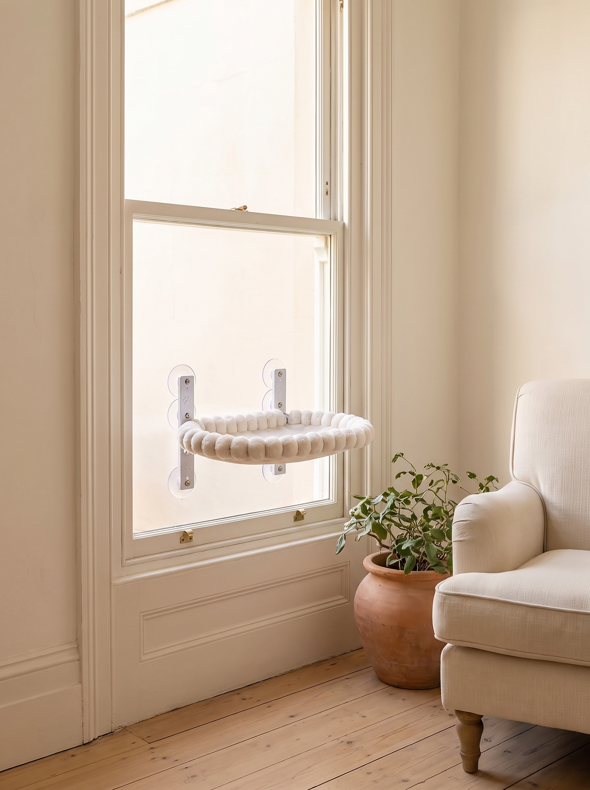 Cat window hammock in a styled home