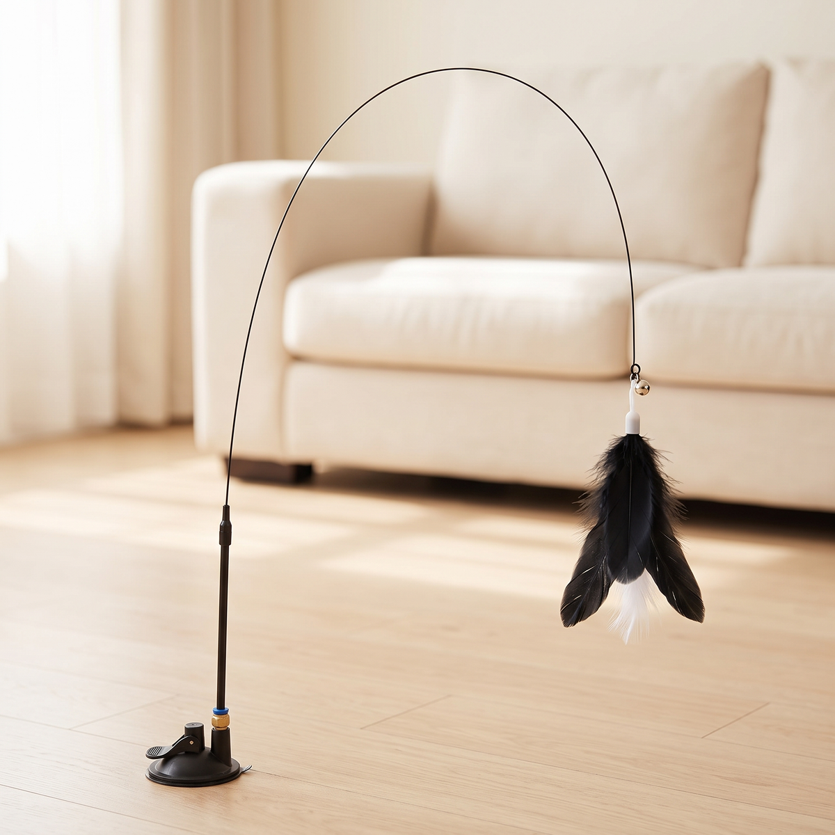 Suction cup cat feather wand standing on an oak floor in a living room