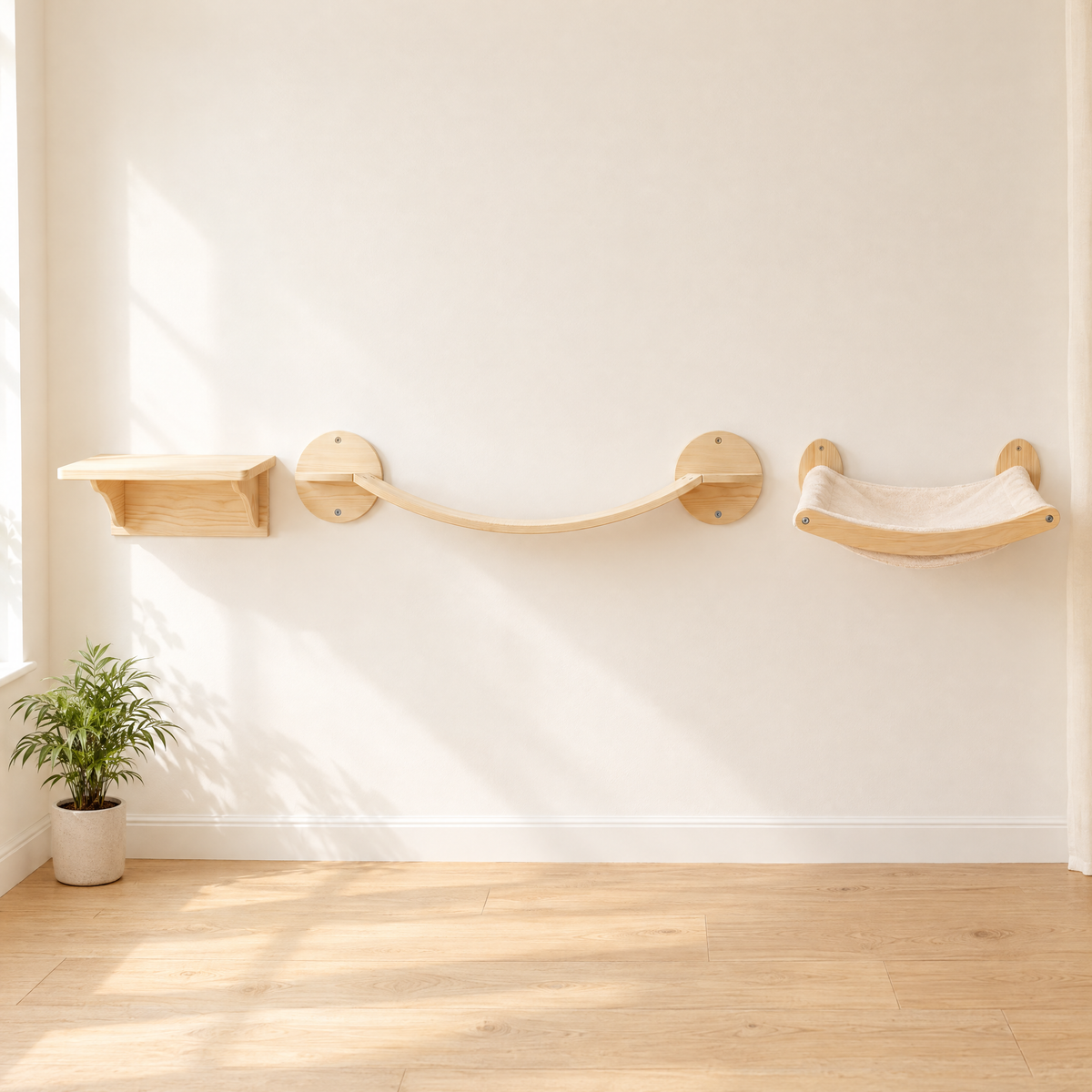 The Bridge Run cat wall set: jump shelf, wave bridge and curved lounger mounted in a line on a cream wall