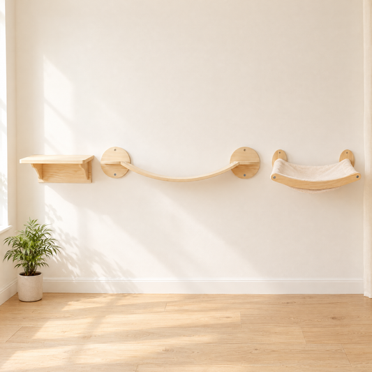 The Bridge Run cat wall set: jump shelf, wave bridge and curved lounger mounted in a line on a cream wall