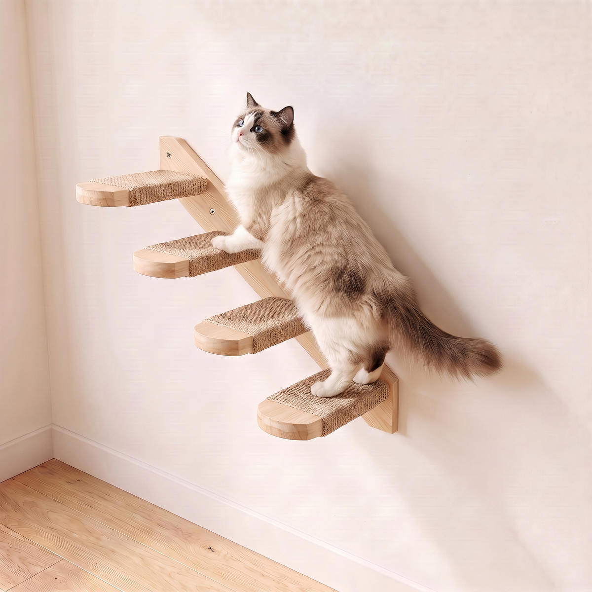 Ragdoll cat climbing a four step sisal cat wall staircase in pale pine