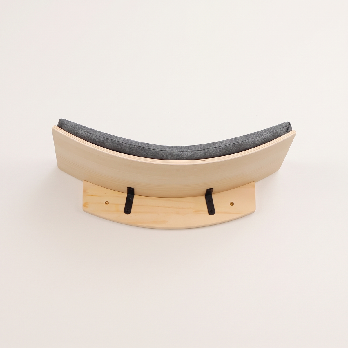 Front view of the 50cm curved cat wall cradle mounted on a plain cream wall
