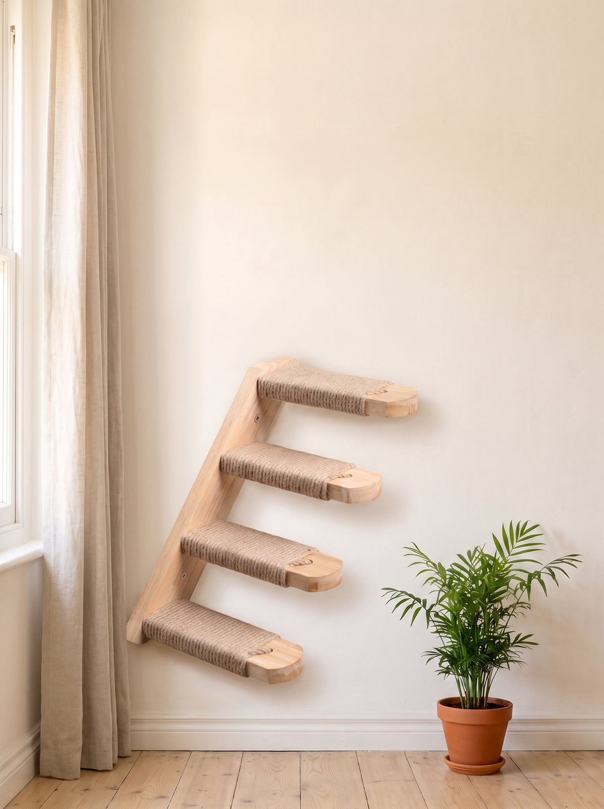 Four step sisal cat wall staircase in pale pine beside a window in a bright cream room